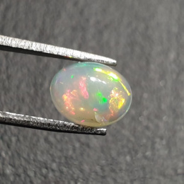 Opal z Etiopii kaboszon 9x7 mm nr 339