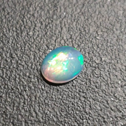 Opal z Etiopii kaboszon 9x7 mm nr 341