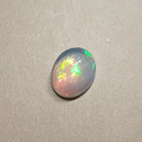 Opal z Etiopii kaboszon 9x7 mm nr 341