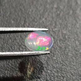Opal z Etiopii kaboszon 9x7 mm nr 343