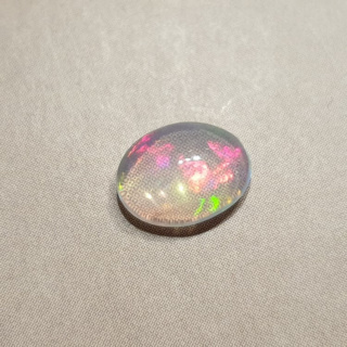 Opal z Etiopii kaboszon 9x7 mm nr 343