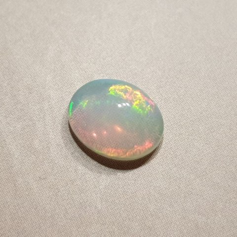 Opal z Etiopii kaboszon 9x7 mm nr 349