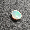 Opal z Etiopii kaboszon 9x7 mm nr 349