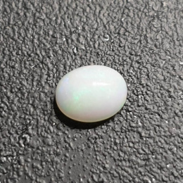 Opal z Etiopii kaboszon 9x7 mm nr 350