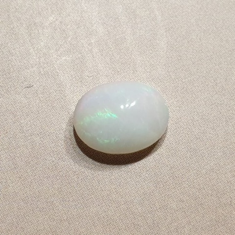 Opal z Etiopii kaboszon 9x7 mm nr 350