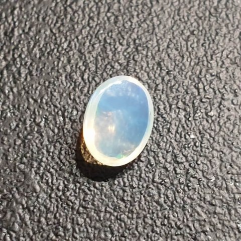 Opal z Etiopii kaboszon 9x7 mm nr 351