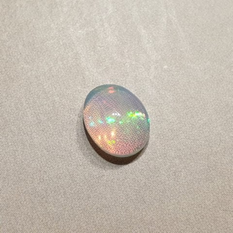 Opal z Etiopii kaboszon 9x7 mm nr 355