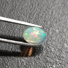 Opal z Etiopii kaboszon 9x7 mm nr 356