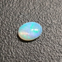 Opal z Etiopii kaboszon 8x6 mm nr 360