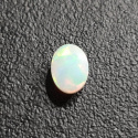 Opal z Etiopii kaboszon 8x6 mm nr 363