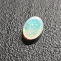 Opal z Etiopii kaboszon 8x6 mm nr 370