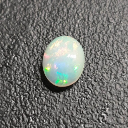 Opal z Etiopii kaboszon 9x7 mm nr 359
