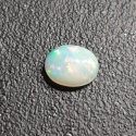 Opal z Etiopii kaboszon 9x7 mm nr 359