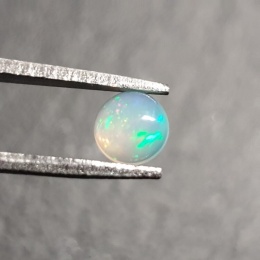 Opal z Etiopii kaboszon fi 5 mm nr 477