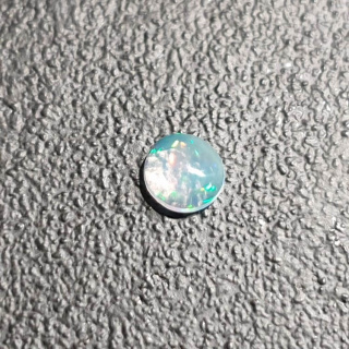 Opal z Etiopii kaboszon fi 5 mm nr 490