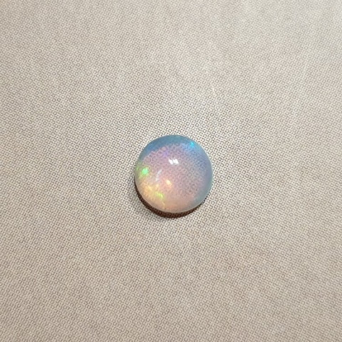 Opal z Etiopii kaboszon fi 5 mm nr 499