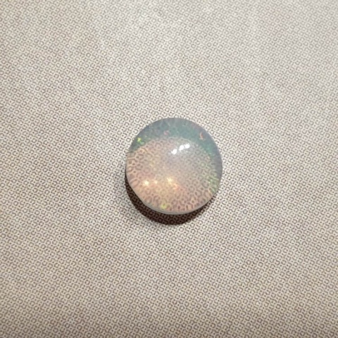 Opal z Etiopii kaboszon fi 5 mm nr 500