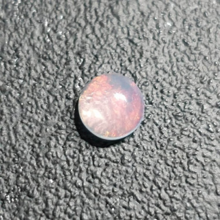 Opal z Etiopii kaboszon fi 6 mm nr 439