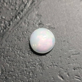 Opal z Etiopii kaboszon fi 6 mm nr 449