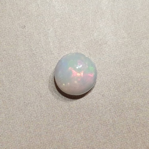 Opal z Etiopii kaboszon fi 6 mm nr 449