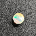 Opal z Etiopii kaboszon fi 7 mm nr 412