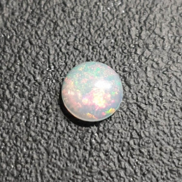 Opal z Etiopii kaboszon fi 7 mm nr 413