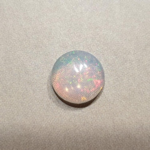 Opal z Etiopii kaboszon fi 7 mm nr 413