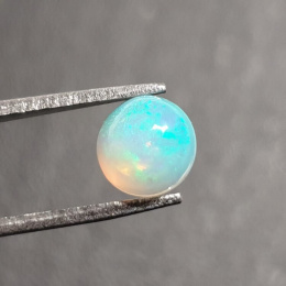 Opal z Etiopii kaboszon fi 7 mm nr 414