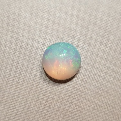 Opal z Etiopii kaboszon fi 7 mm nr 414