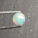 Opal z Etiopii kaboszon fi 7 mm nr 421