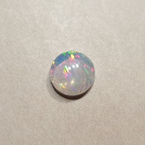 Opal z Etiopii kaboszon fi 7 mm nr 426