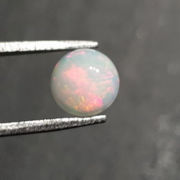 Opal z Etiopii kaboszon fi 7 mm nr 429
