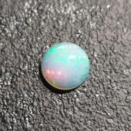 Opal z Etiopii kaboszon fi 8 mm nr 387