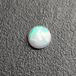 Opal z Etiopii kaboszon fi 8 mm nr 394