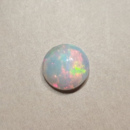 Opal z Etiopii kaboszon fi 8 mm nr 396