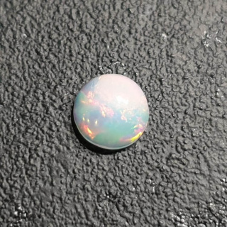 Opal z Etiopii kaboszon fi 8 mm nr 398