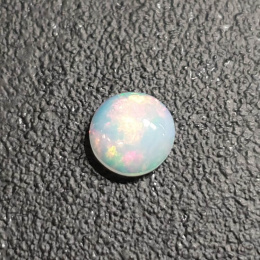 Opal z Etiopii kaboszon fi 8 mm nr 404