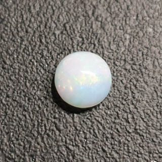 Opal z Etiopii kaboszon fi 8 mm nr 409