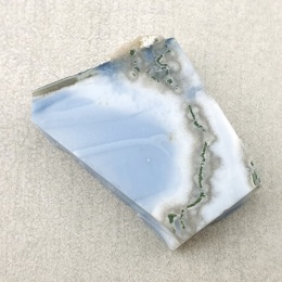 Opal niebieski cięty surowy 28x22 mm nr 69