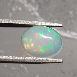 Opal z Etiopii kaboszon 9,75x7,89 mm nr 48