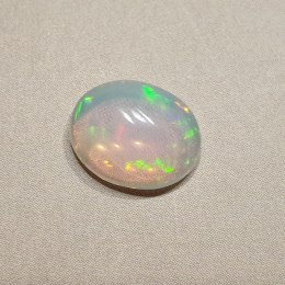 Opal z Etiopii kaboszon 9,75x7,89 mm nr 48
