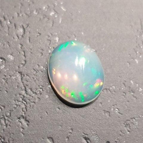 Opal z Etiopii kaboszon 9,75x7,89 mm nr 48