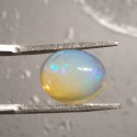 Opal z Etiopii kaboszon 11,08x8,92 mm nr 100