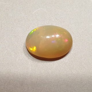 Opal z Etiopii kaboszon 11,15x8,05 mm nr 102