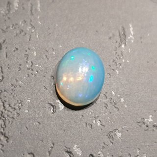 Opal z Etiopii kaboszon 8,90x7,02 mm nr 137