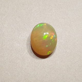 Opal z Etiopii kaboszon 9,02x7,11 mm nr 121