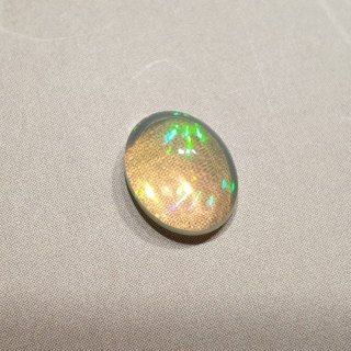 Opal z Etiopii kaboszon 9,05x7,19 mm nr 118