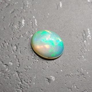 Opal z Etiopii kaboszon 9,07x7,11 mm nr 119