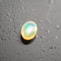 Opal z Etiopii kaboszon 9,07x7,11 mm nr 119