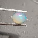 Opal z Etiopii kaboszon 9,17x7,21 mm nr 133